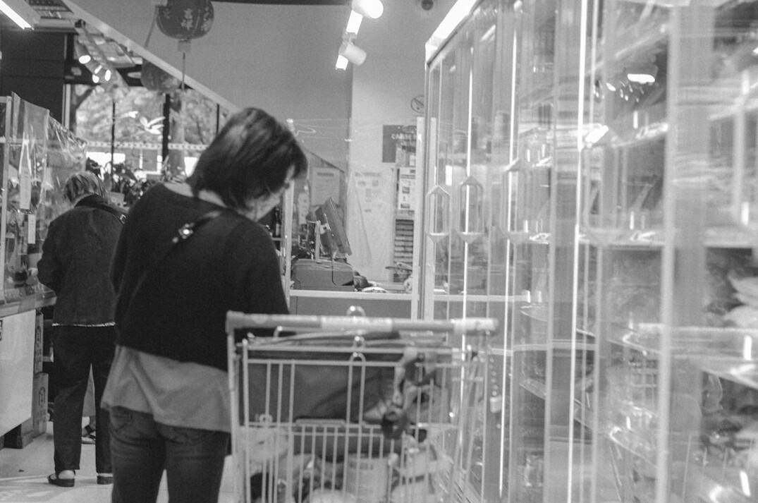 store detective observing shopper