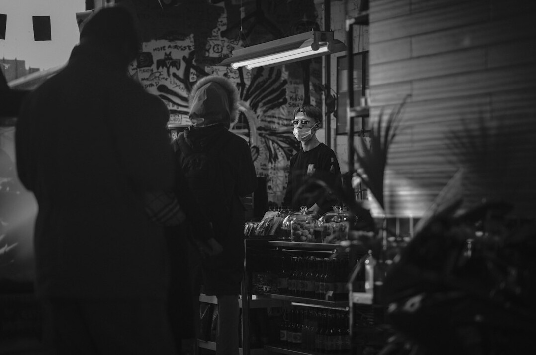 store detective watching shopper
