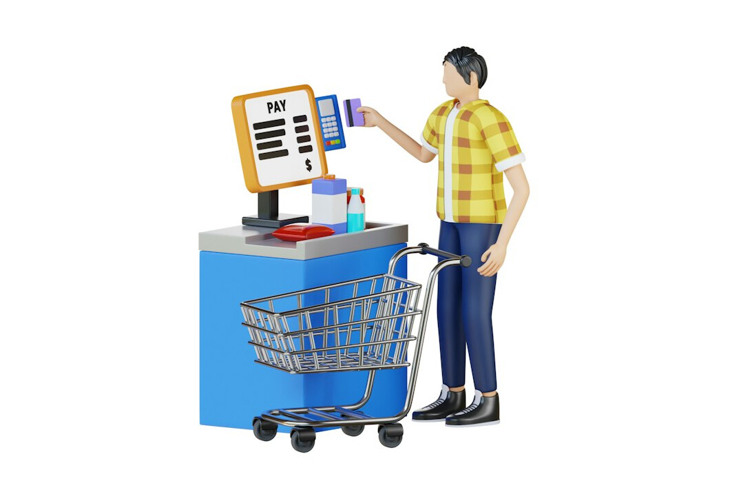 customer checking out at supermarket